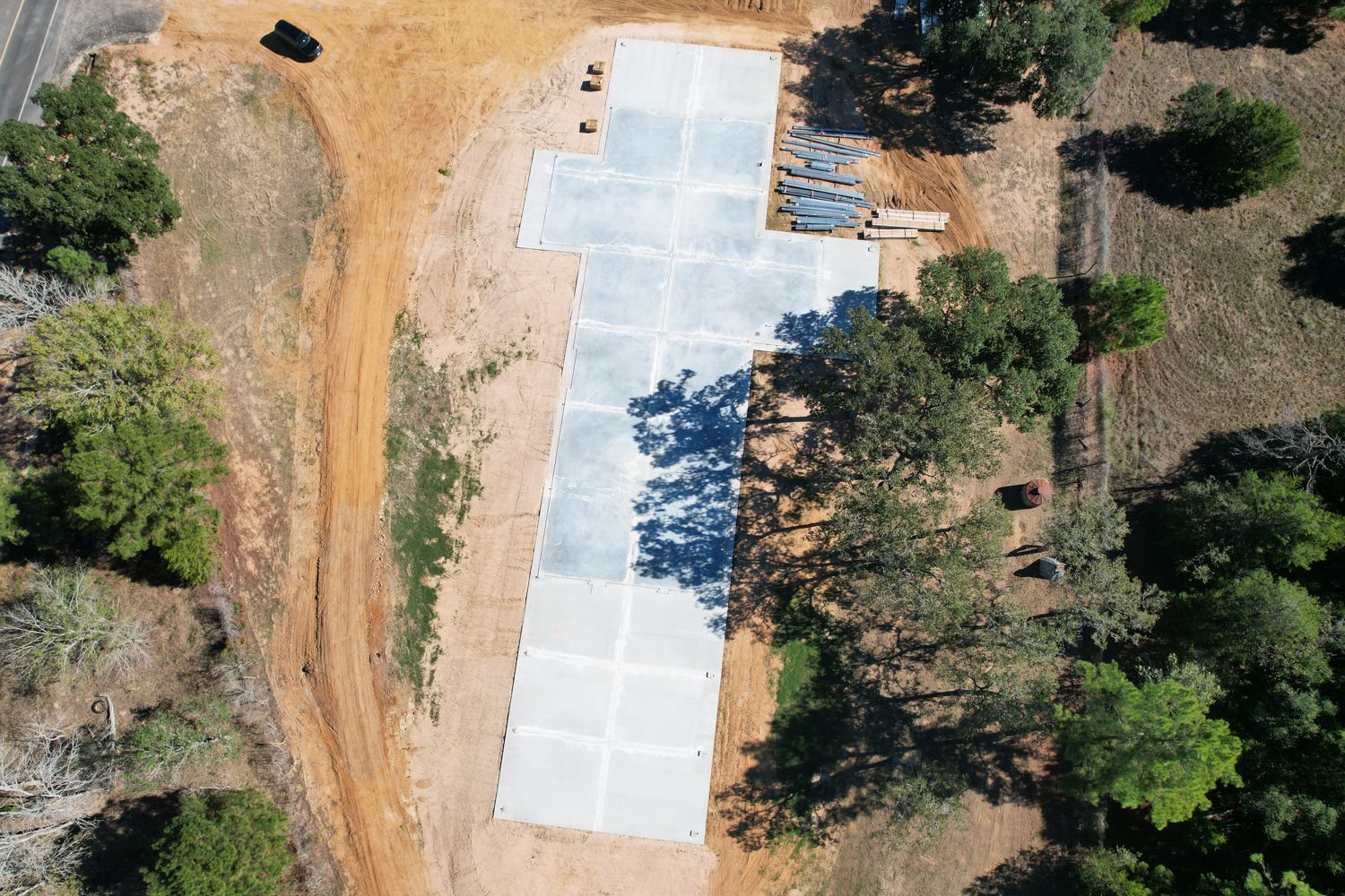 concrete slab foundation for 50x235 metal building near Columbus Texas